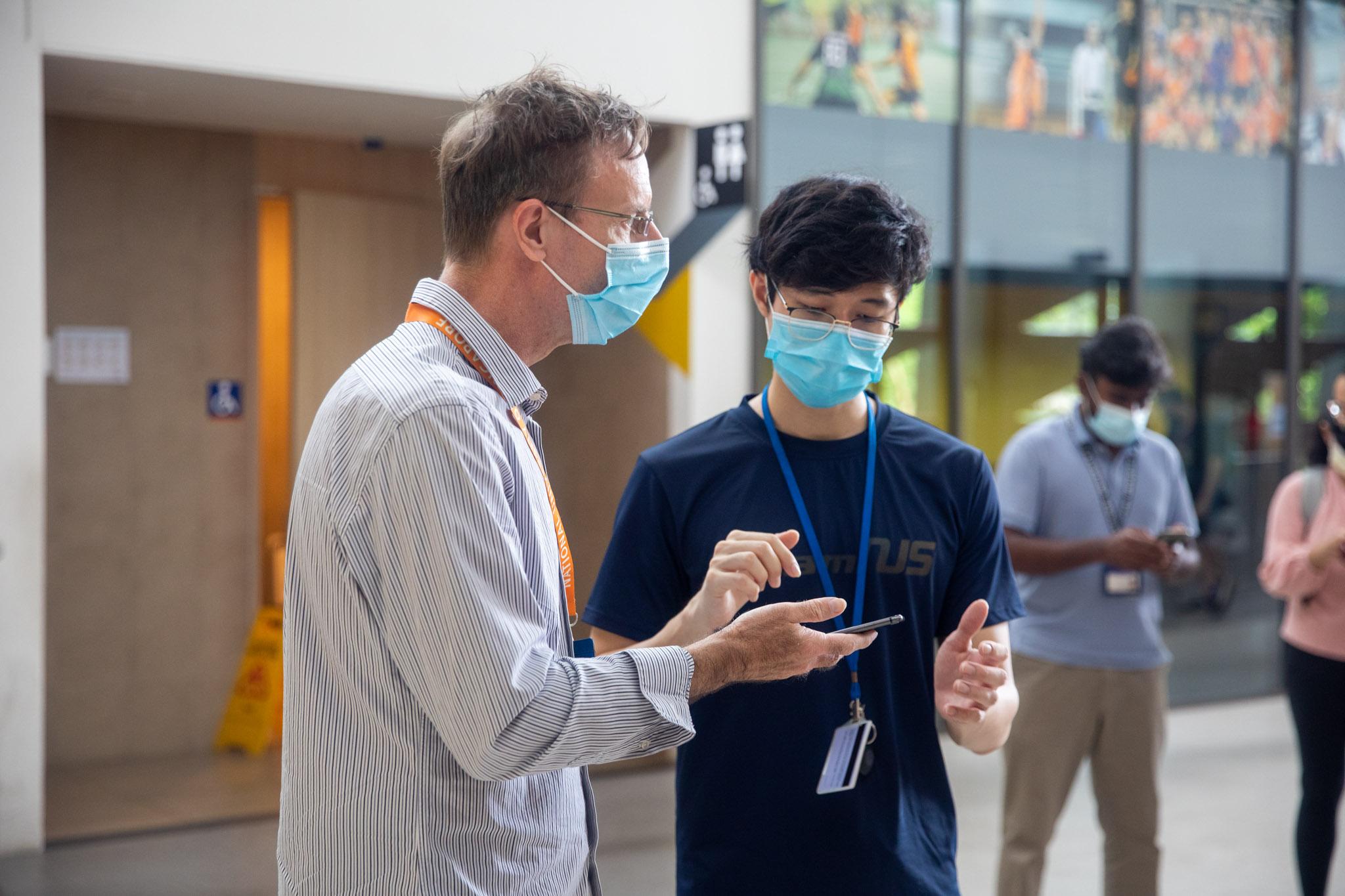 NUS Swimming Captain Yeo Kee Juan had to ensure that only eligible staff and student were allowed to proceed to the sports hall to collect their test kits
