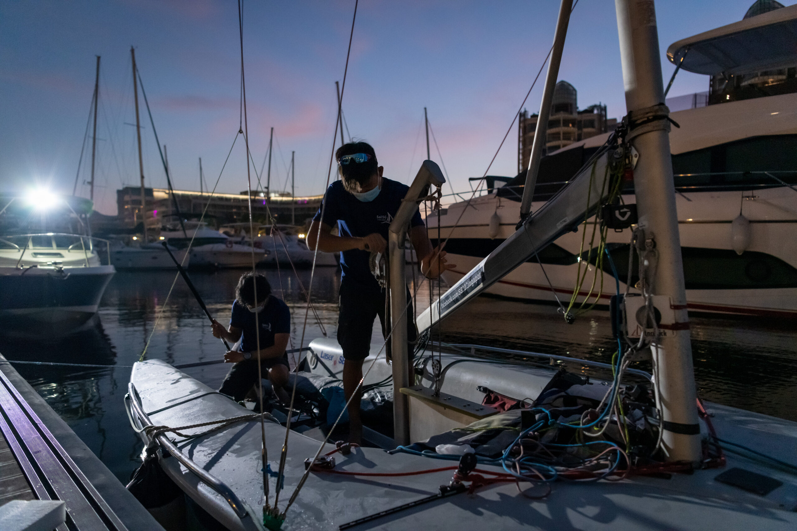 Day 2, 26 Sep, 7:00am, ONE°15 Marina Sentosa Cove: Students from NUS Sailing doing their final checks before continuing their voyage around Singapore  

