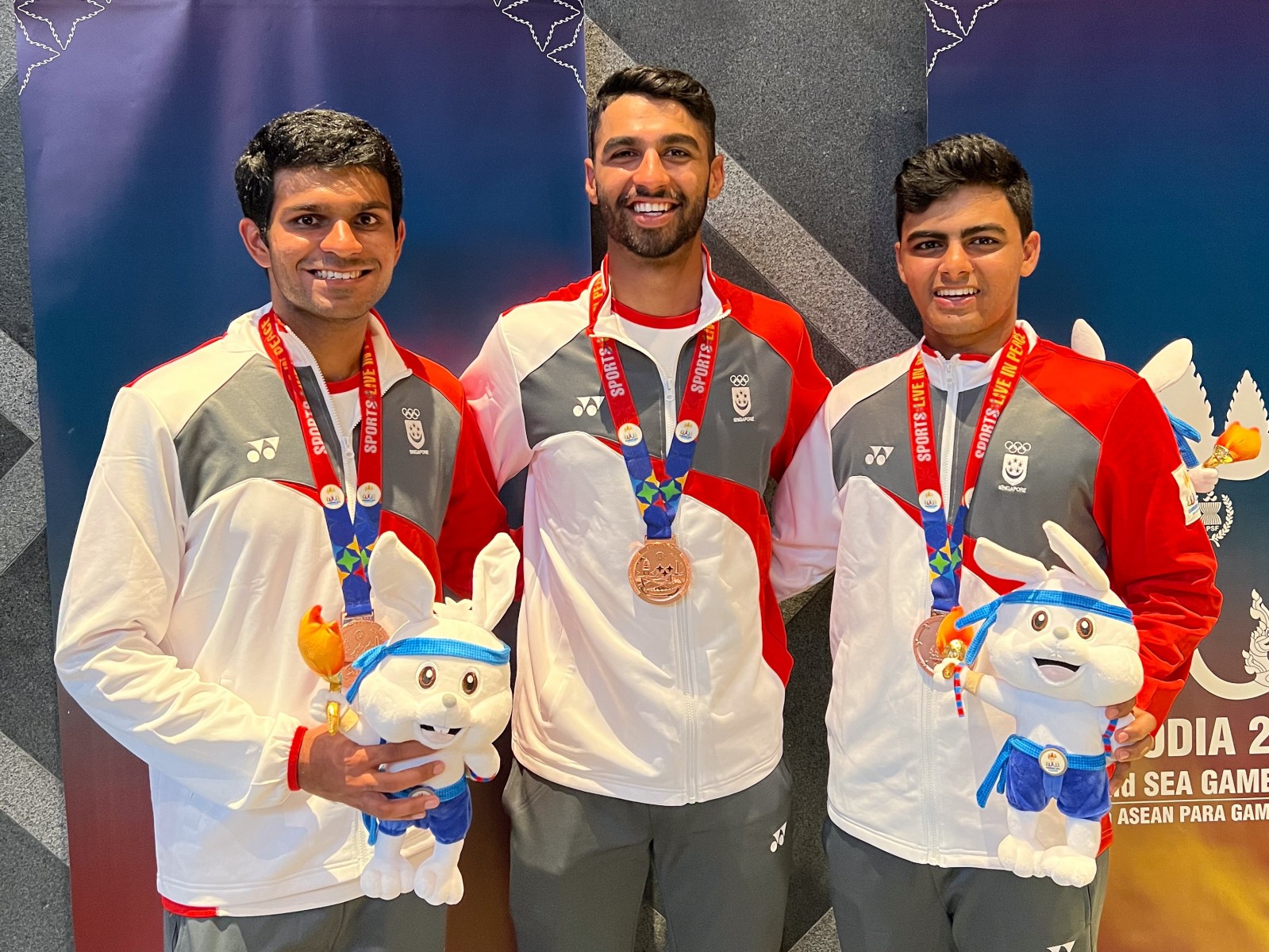 All smiles for TeamNUS cricket athletes (from left to right) Aahan Gopinath Achar, Avi Dixit and Aman Desai, as they took home medals in the men’s T20, T10 and Sixes.
