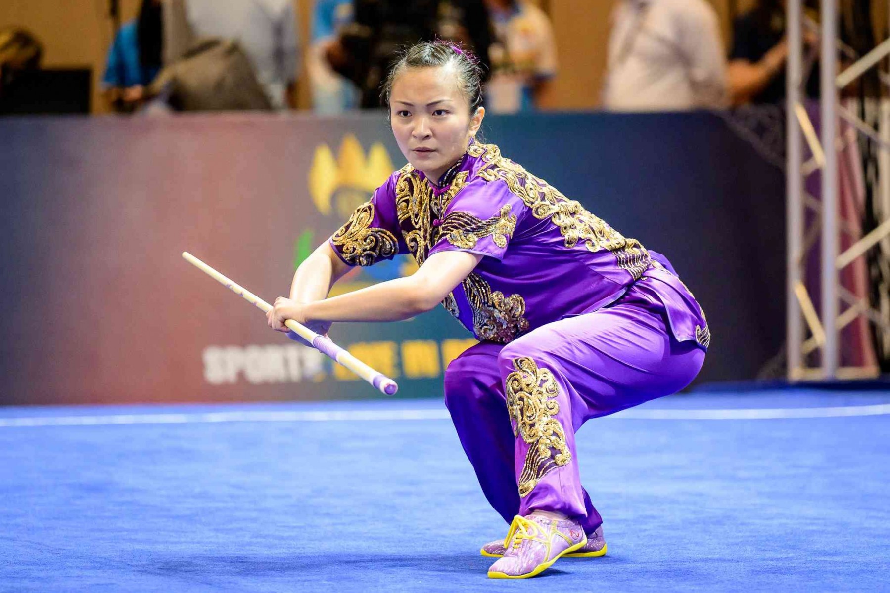 Kimberly Ong showed her finesse with her strong and confident moves at the women’s wushu competition. (Photo: Singapore National Olympic Council/ Weixiang Lim)

