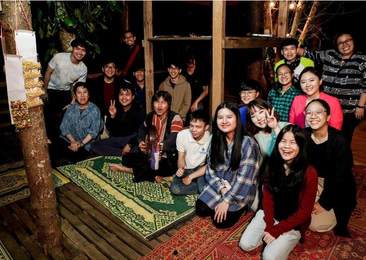 Elicia credits the close-knit music community at YSTCM for supporting her love for music and performance. Here they are, at a music education trip to rural Thailand. (Credit: YSTCM)

