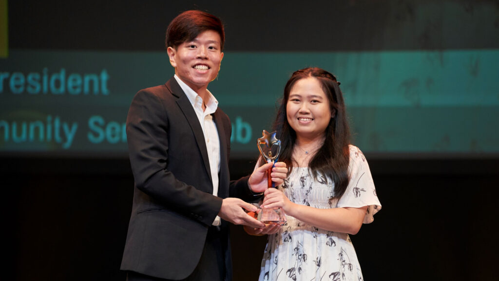 Leadership Distinction recipient Tan Wei Shuang (right) received her award from Richmond Sin who received the same award in 2022.