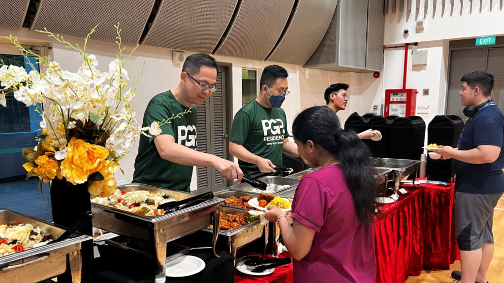 Dr Lee (first from left) makes it a point to participate in the Residence’s many community activities, including events welcoming new residents and outdoor activities.