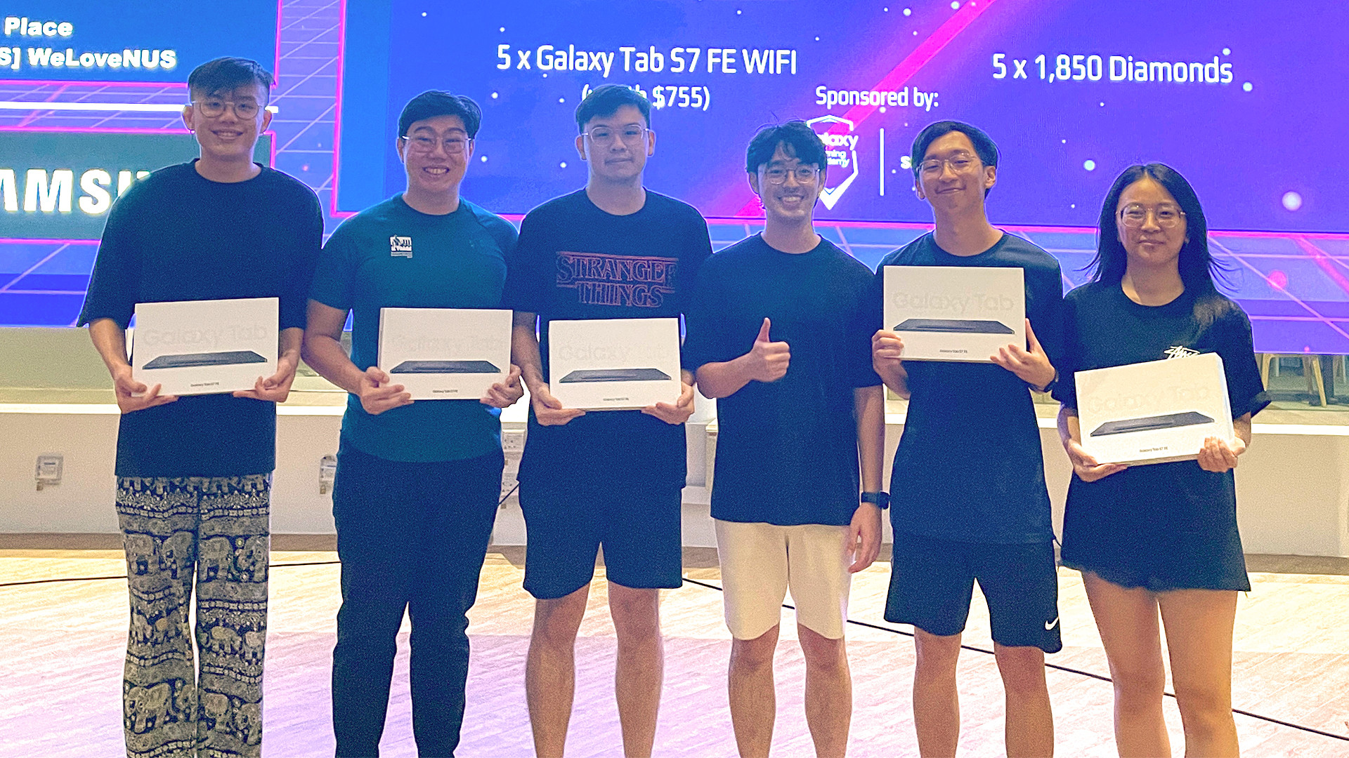 Year 4 Mechanical Engineering undergraduate Angel Clarita Juspi (extreme right) was part of the NUS team that won the Mobile Legends: Bang Bang tournament at IVGF 2023.