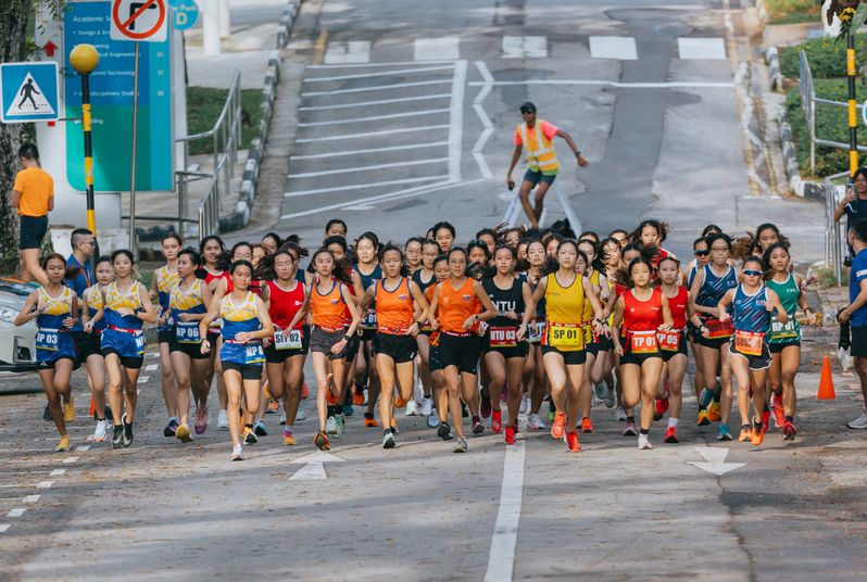 Women’s Road Race athletes (left to right, in orange jerseys: Toh Ting Xuan (Year 4, Faculty of Science), Clarice Lau (Year 3, College of Design & Engineering), and Joyceleen Yap (Year 4, Faculty of Arts & Social Sciences)

