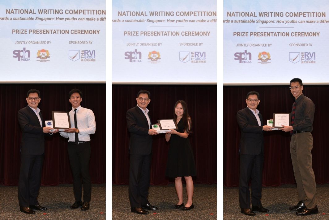(From left) Nicholas Ong, Celeste Chua and Bryan Voon receive their awards from DPM Heng Swee Keat.
