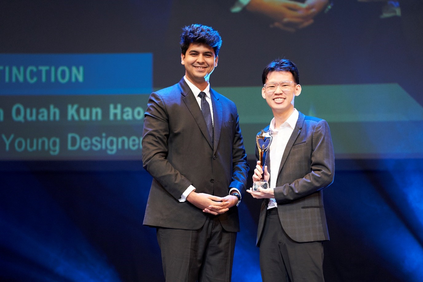 Ryan receiving the Distinction award for the Competitions (General) category at NAA 2023. Beside him is the award presenter, Karthik Vyas who received the same award the year before.