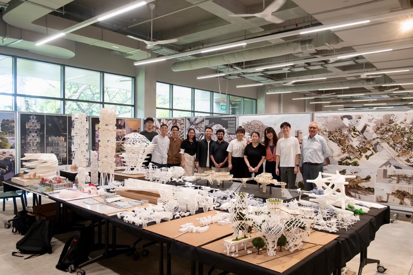 Ryan (second from right) at his end-of-semester architectural presentation and critique session at the studio