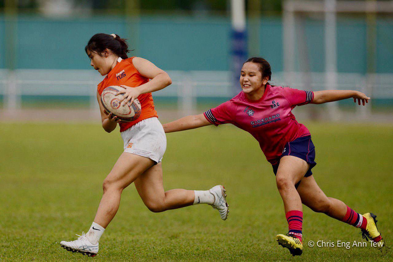 For Joy (left), the sense of liberation that comes with outmanoeuvring the defenders and running towards the try line is the main draw of the game. (Photo: Thatparticularshot)