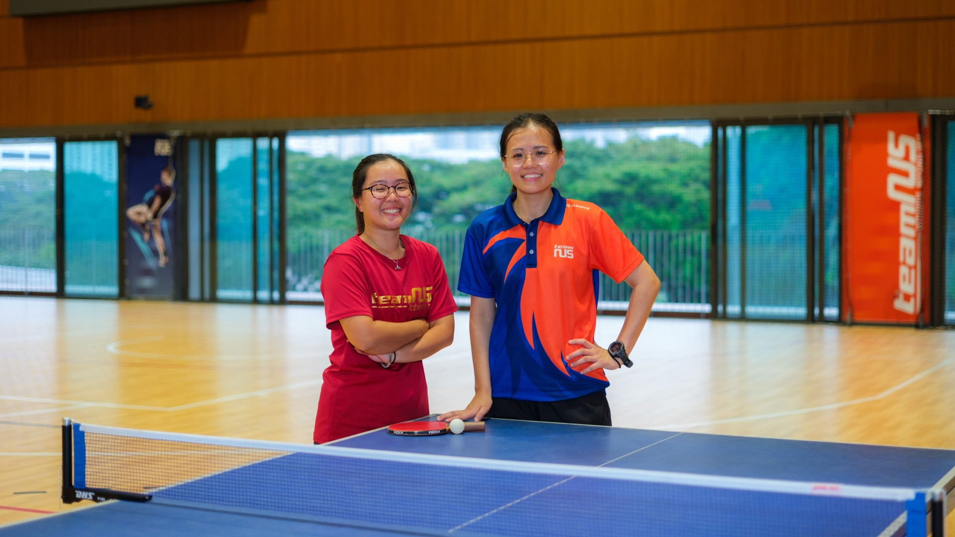 Janine (left) has expressed her appreciation for her sports manager Riley Tan (right) for her guidance alongside her sporting journey in NUS.