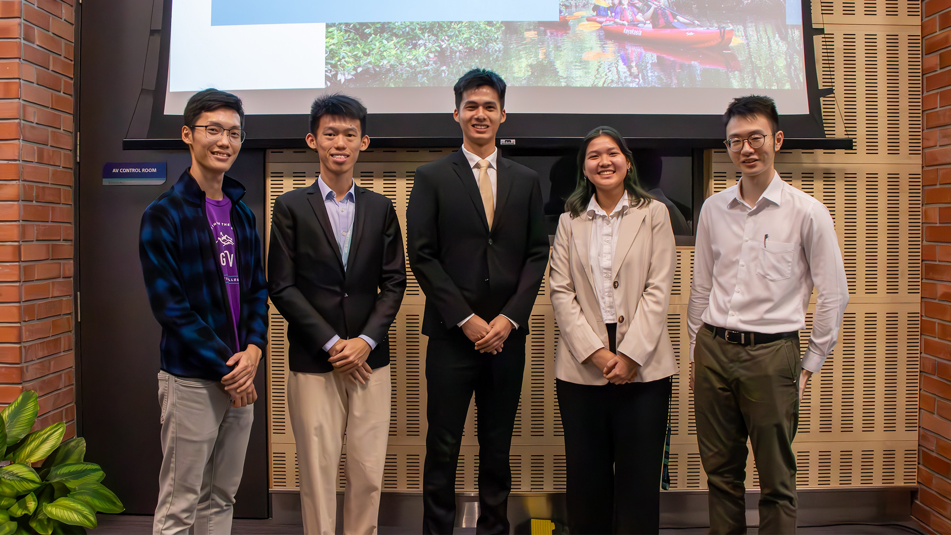 The RVRC Symposium 2024 Organising Committee comprised (from left to right) Chye Yi De, Year 2 undergraduate from the College of Design and Engineering; Lim Yi Kai, Year 2 undergraduate from the Faculty of Arts and Social Sciences (FASS); Jason Qiu, Year 4 undergraduate from the School of Computing; FASS graduate Khin Hnin Su and Business graduate Zhang Xiangyu Oliver, both from the Class of 2024.