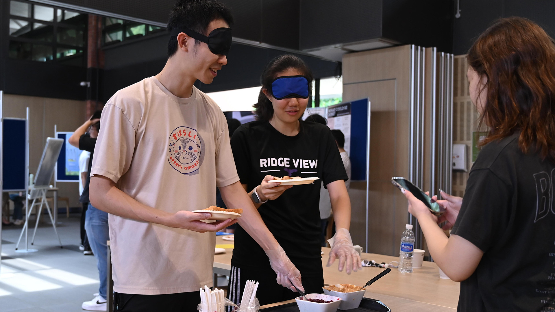 An informative booth at OutRidge that was designed by RVRC students featuring activities to raise awareness of the daily challenges faced by persons with visual disability.