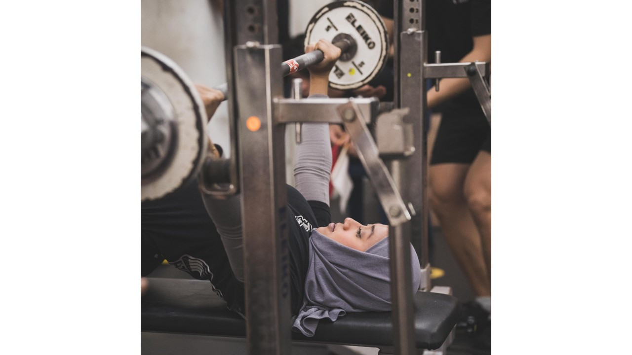 Starting in the sport just a year ago, Syafiqah’s persistence and hard work has led her to take part in powerlifting competitions, such as the Powerlifting NUS Maxout Series 2024. (Photo: Lee Chee Wan)