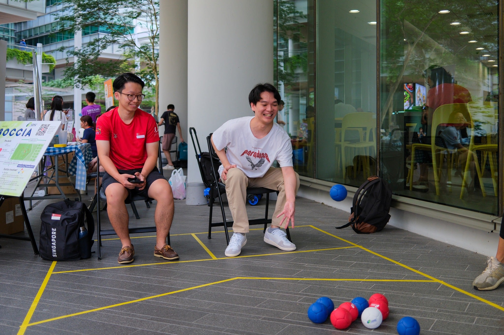 488486834_1080671654094497_2561997803058140306_n Two participants try their hand at boccia, a game of strategy and precision designed for diverse mobility needs.