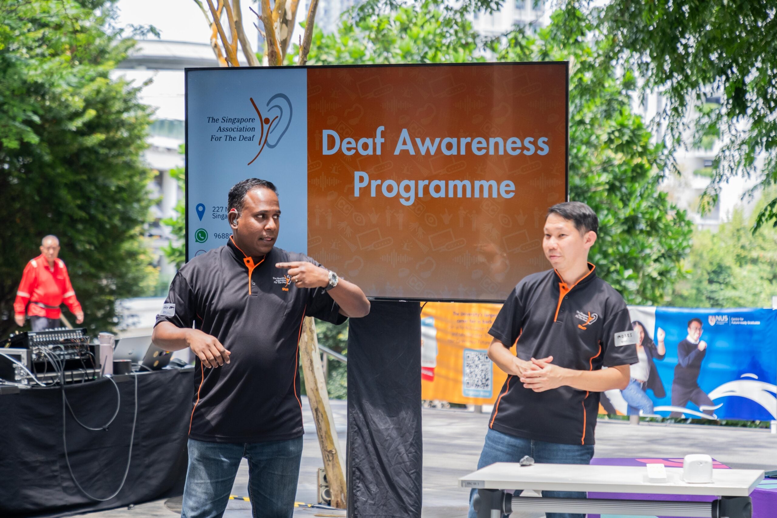 DSC01678 Facilitators from The Singapore Association for the Deaf (SADeaf), both SGSL instructors, leading a Deaf Culture, Community and Language workshop which introduced participants to tips for Deaf allyship and basic Singapore Sign Language.