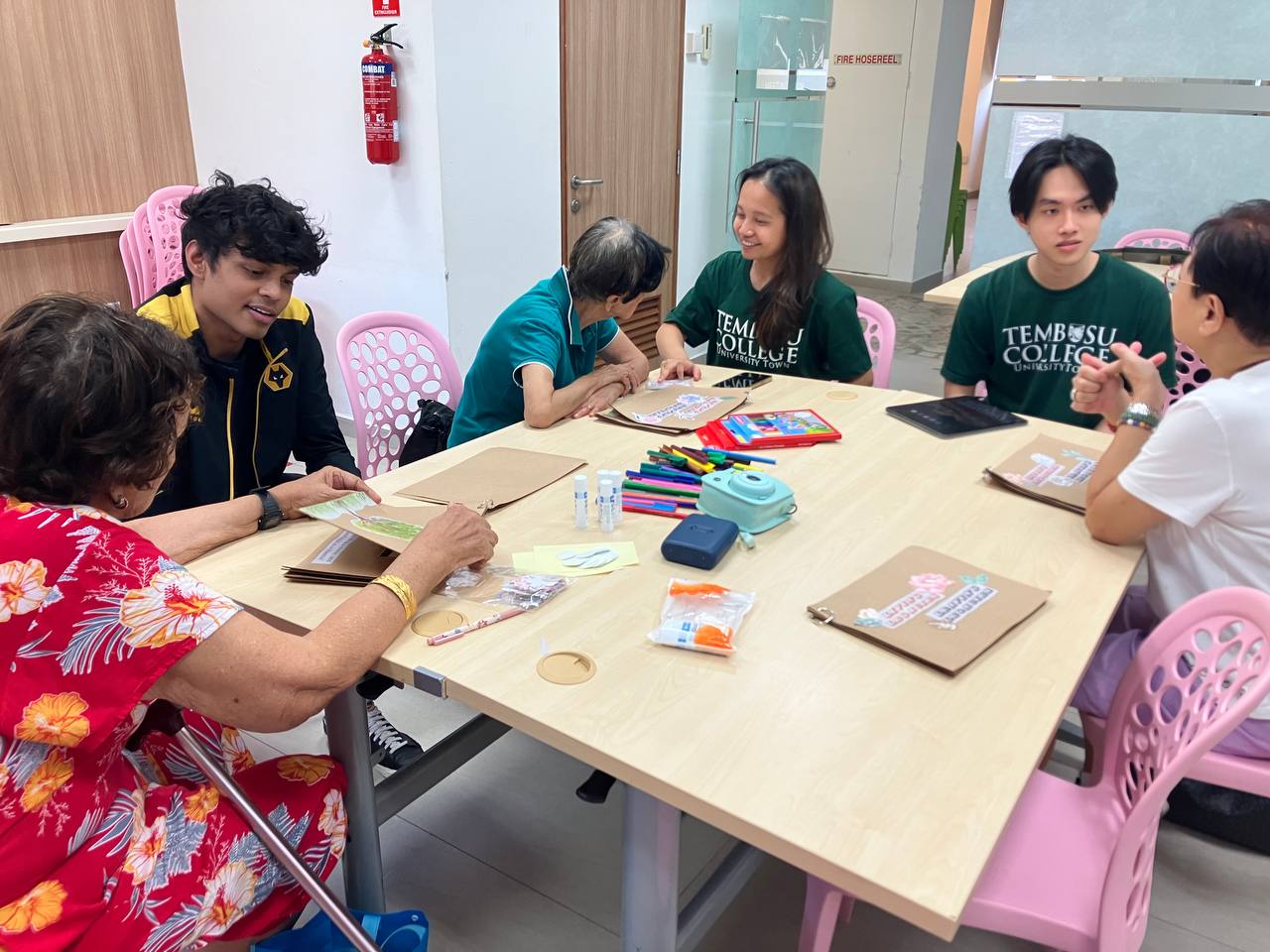 nntc-3
Tembusu College students use their assistive tool to facilitate end-of-life planning conversations with seniors at St Luke’s Eldercare (Ayer Rajah).
