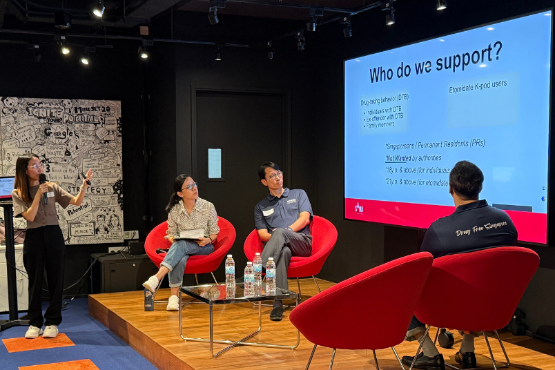 Ms Rhea Tan (SANA) introduced Step‑Up @Taman Jurong, a safe community space for addiction support and recovery through counselling, case management and rehabilitation.