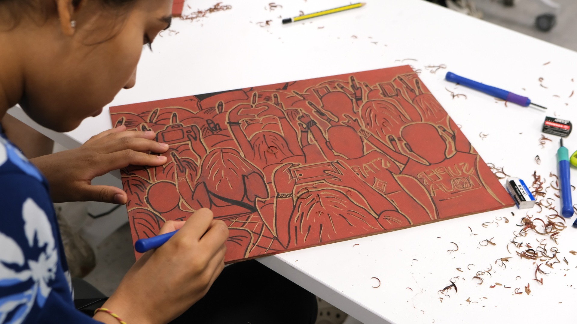 A participant carves concertgoers at Supernova, NUS’ annual outdoor music and dance festival and one of its biggest student life events.