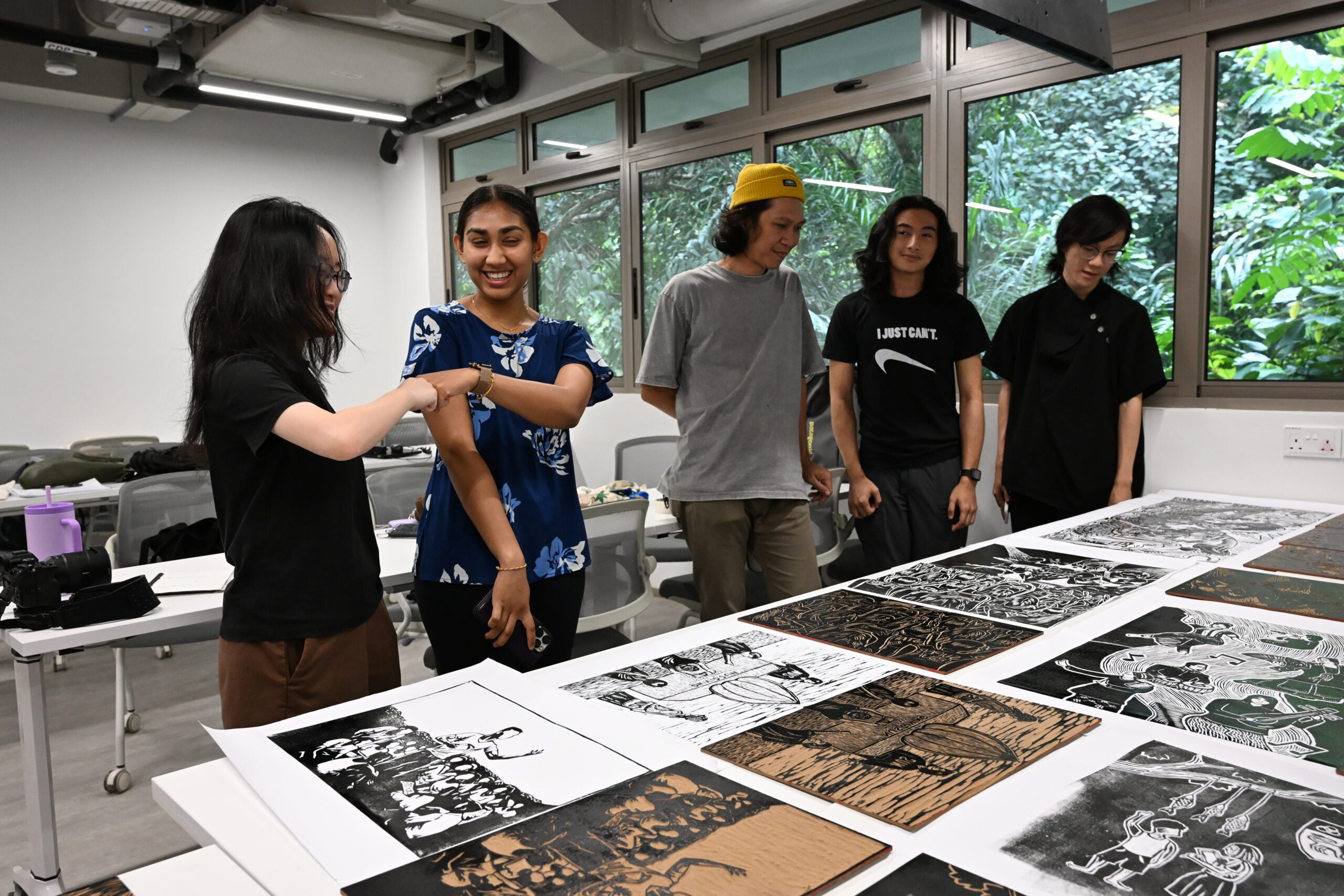 Students sharing about the stories behind theirdesigns and refining what feels “uniquely NUS”.