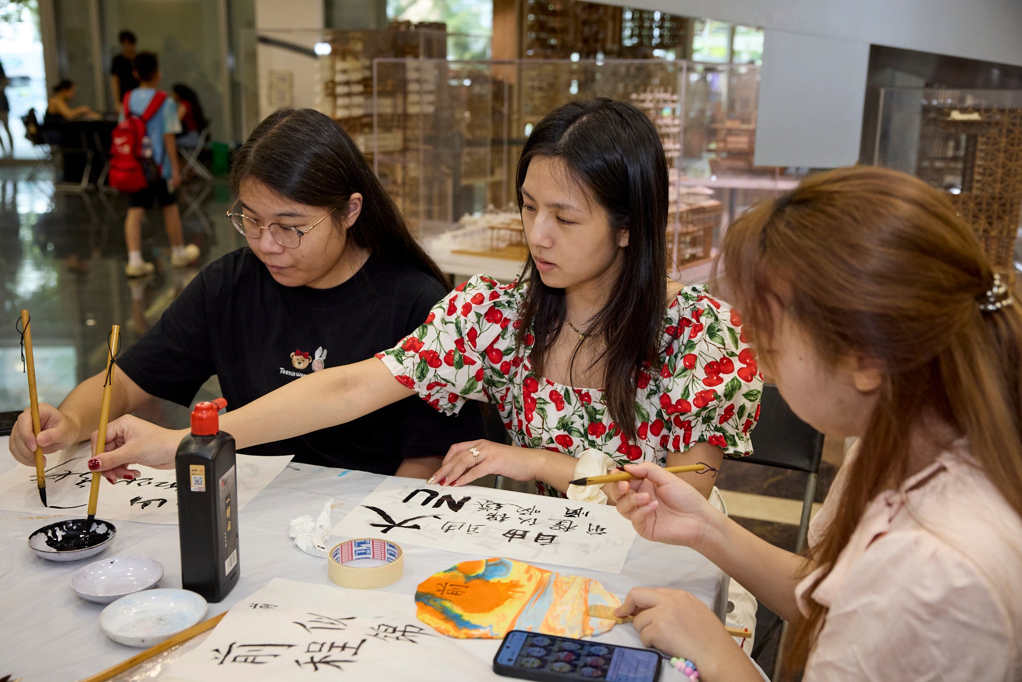 The crafter's booths included the Chinese Calligraphy Club, where students tried their hands at the art of calligraphy.