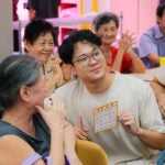 Students from NUS Business School Flag 2026 shared an afternoon of bingo, laughter and new friendships with seniors at CareElderly @ Golden Ginger Active Ageing Centre. The activity was part of 12 community engagement sessions in partnership with Care Community Services Society (CCSS) to spark joy and strengthen community ties.