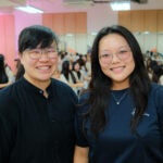 Ms Kelda Chua (left), Volunteer Manager at CCSS, said, “By consistently showing up and spending time with them, NUS Business School flag volunteers have helped build trust, creating a space where our beneficiaries feel comfortable to participate, share stories and encourage one another.” For Business Administration freshman Kate Lee (right), seeing the seniors' joy throughout the afternoon made the experience especially meaningful and a fulfilling way to spend the weeks before the start of the new semester.