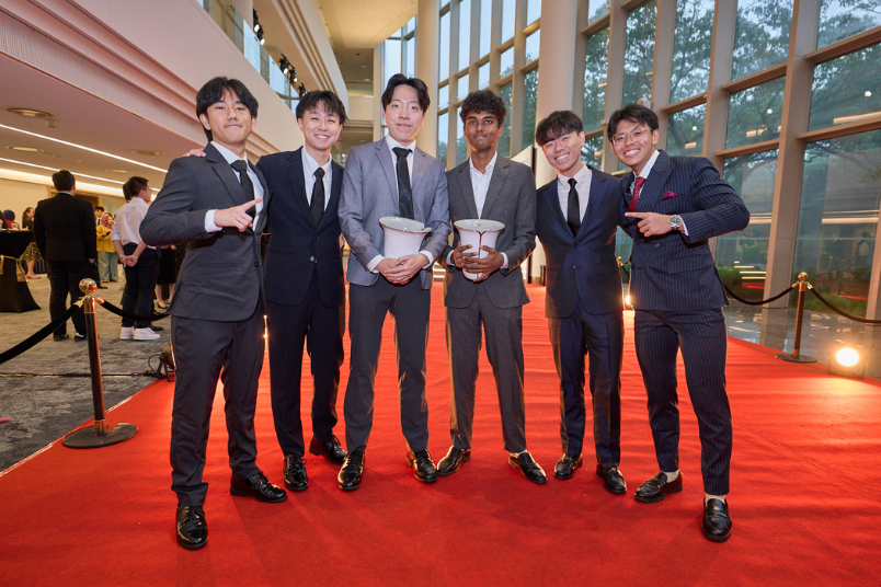 Members from the Bizad Charity Run 2026 team celebrate their victory on the red carpet. The Run raised $90,000 for its beneficiaries. 